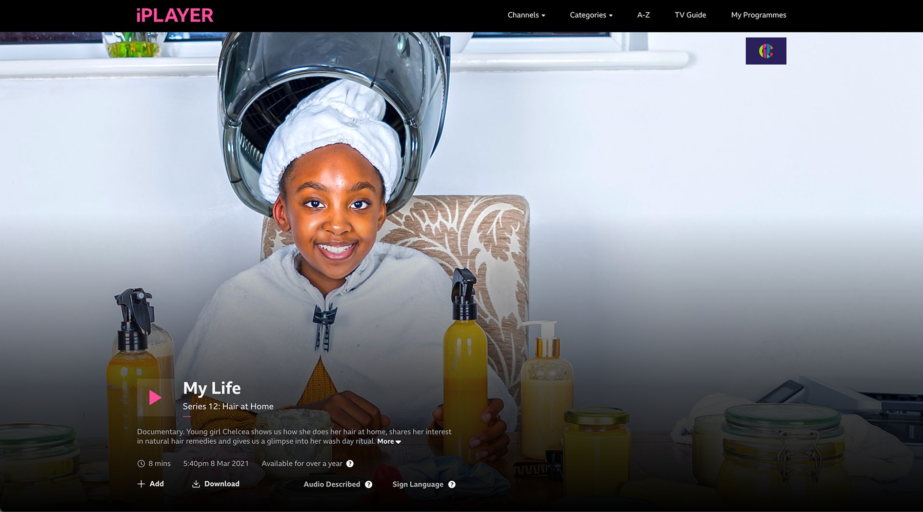 The young contributor to CBBC My Life: Hair at Home, smiling at the camera